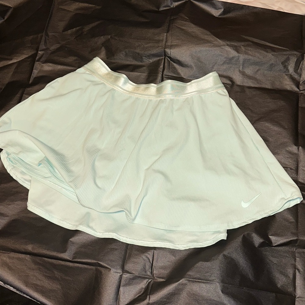 Turquoise women’s tennis skort size large